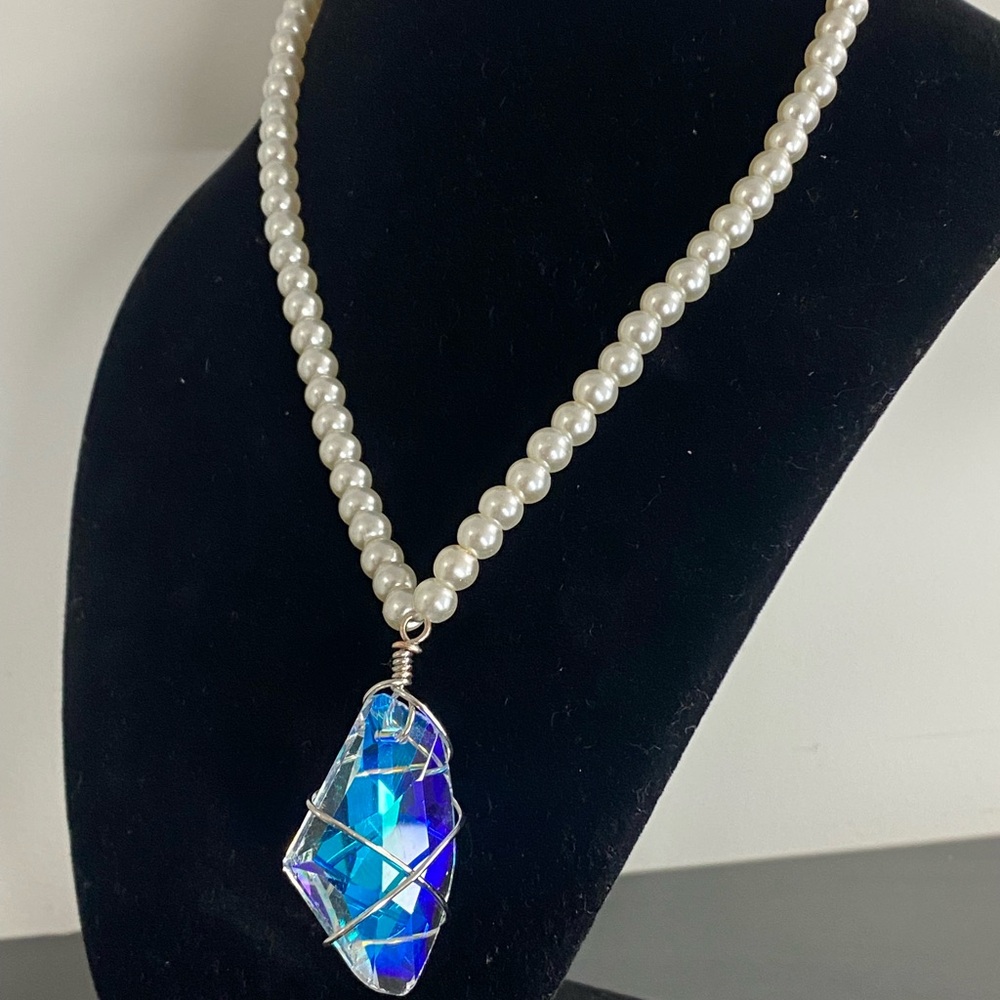 Elegant Pearl Necklace with Blue Crystal Pendant